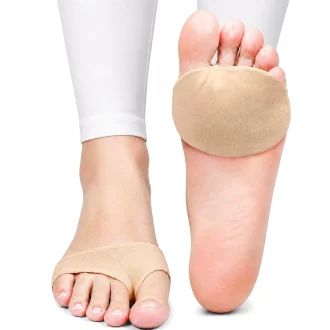 main product image of a pair of cushioned pads designed for Morton’s Neuroma support is shown on a woman’s foot against a plain white background. The soft gel cushion rests beneath the forefoot, providing shock absorption and reducing pressure on the metatarsal area. A contoured metatarsal bar lifts and separates the toes, aligning the bones to alleviate nerve compression. Breathable fabric wraps around the foot, securing the pad in place while moisture-wicking materials ensure comfort. The slim, low-profile design integrates discreetly with footwear, offering targeted relief for ball-of-foot discomfort. Reinforced edges prevent shifting during movement, maintaining consistent support throughout the day.