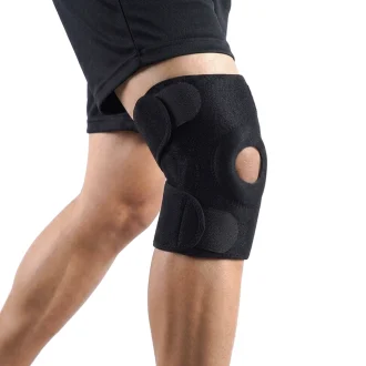 man wearing our arthritis knee brace on one of his knees