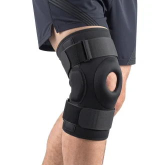 product image of man wearing the Knee stabilizer brace for supporting your acl knee ligaments and treating injuries and knee pain
