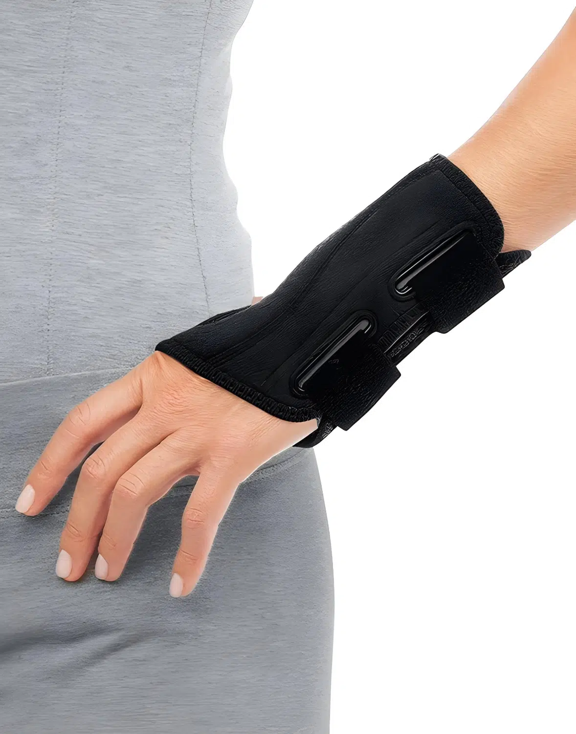 Women's Wrist Support Brace fit snugly around a woman's hand, providing gentle compression, stabilization, and support for various wrist injuries and conditions to aid in recovery and enhance comfort during daily activities.