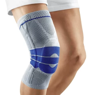 The main product image of our Knee compression support sleeve in colour grey and blue on a mans knee