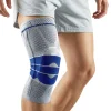 The main product image of our Knee compression support sleeve in colour grey and blue on a mans knee